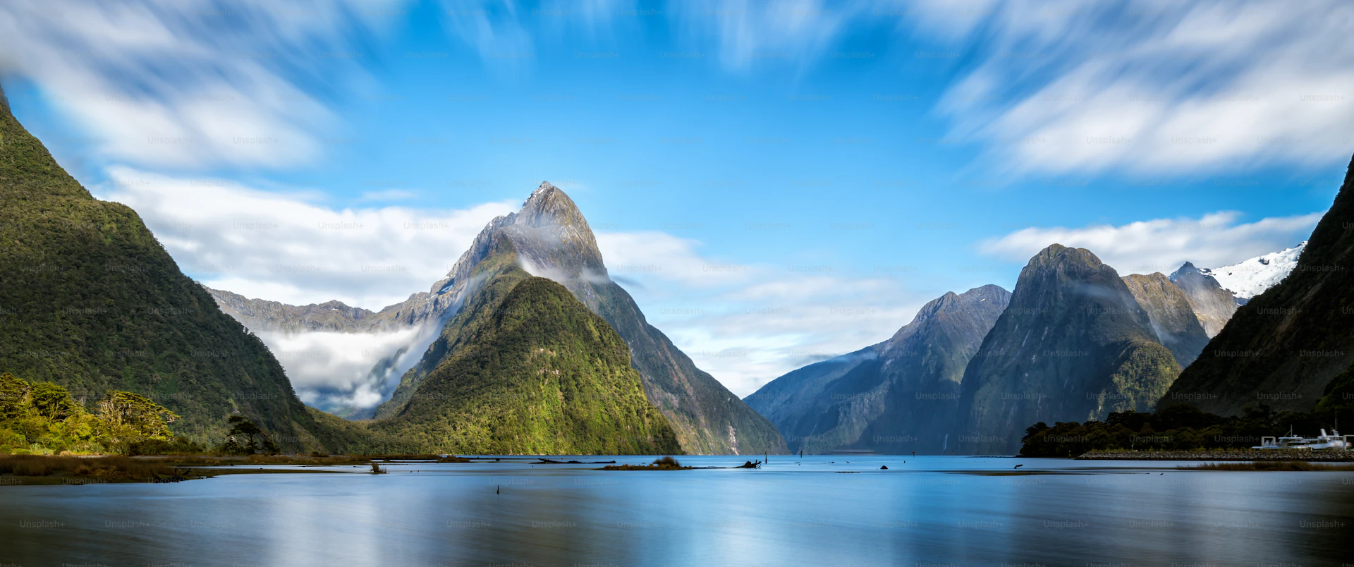 Milford Sound with Mitre Peak and dramatic clouds, New Zealand